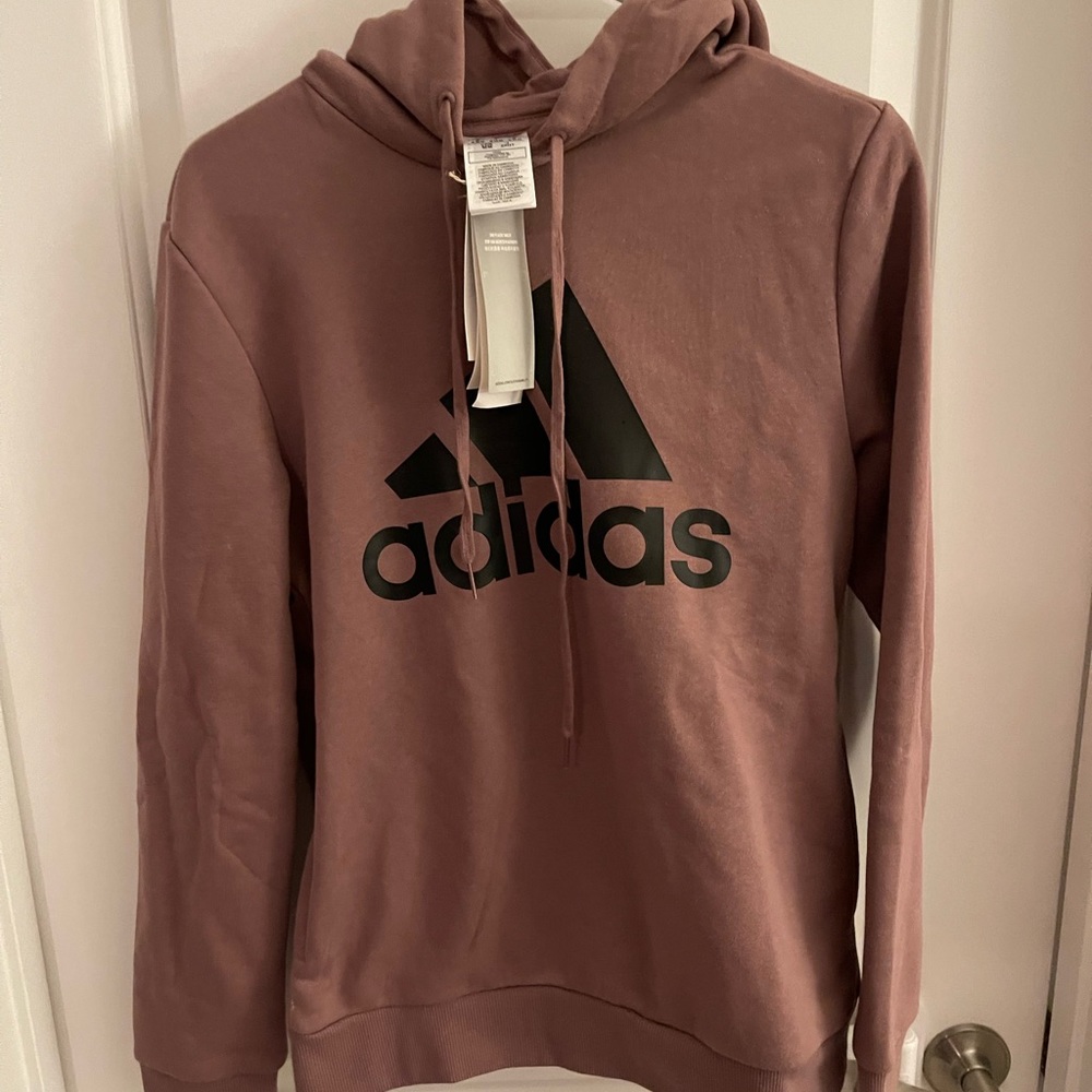 New with tags. Adidas women’s size M sweatshirt